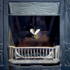 woolly felted bee dangle in fireplace thumbnail