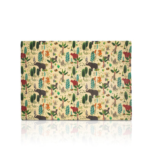 A pack of Beeswax Wraps from Chimney Sheep, showing the brown kraft paper packaging and a single reusable beeswax wrap with a colourful wildflower and animal pattern on a cream background.