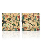 Two square flat beeswax sandwich bags with a cheerful jungle  animal print pattern, displayed side-by-side on a reflective white surface.