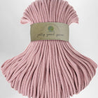 Pink yarn ball with a Jolly Good Yarn label on a white background
