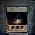 Chimney Sheep handle and safety tag hanging down from a fireplace.