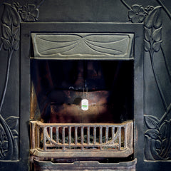 Chimney Sheep handle and safety tag hanging down from a fireplace. thumbnail
