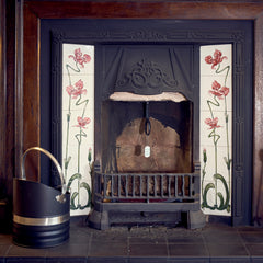A Chimney Sheep handle and safety tag hanging down from an open fireplace. thumbnail