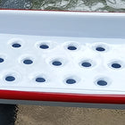 white enamel soap dish with red rim