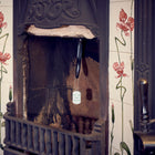 An inserted Chimney Sheep draught excluder with the handle and safety tag showing.