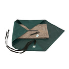 Open green Chimney Sheep wrap with a Chimney Sheep laying on it used to prevent a sooty mess.