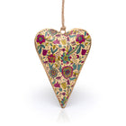 Namaste cream hanging heart ornament with green, red and yellow flowers.